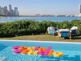 Colourful pool floating signage